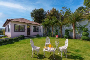 StayVista's Lawn House at Sula Wada - Vintage-Charm Cosy Home with Swimming Pool and Indoor Activities